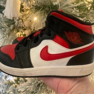 Nike Air Jordans Black, Red, and White Sneakers